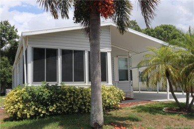 NO POPCORN CEILINGS HERE! This pristine clean unfurnished home on Indianwood Golf and Country Club in Florida - for sale on GolfHomes.com, golf home, golf lot