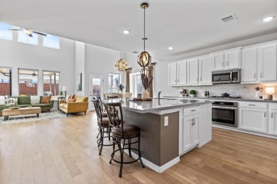 Discover luxury living in this stunning 4-bedroom, 3-bath home on Heath Golf and Yacht Club in Texas - for sale on GolfHomes.com, golf home, golf lot