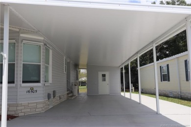 NO POPCORN CEILINGS HERE! This pristine clean unfurnished home on Indianwood Golf and Country Club in Florida - for sale on GolfHomes.com, golf home, golf lot