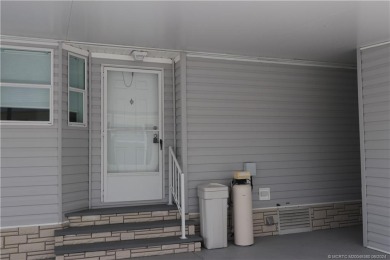 NO POPCORN CEILINGS HERE! This pristine clean unfurnished home on Indianwood Golf and Country Club in Florida - for sale on GolfHomes.com, golf home, golf lot