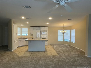 NO POPCORN CEILINGS HERE! This pristine clean unfurnished home on Indianwood Golf and Country Club in Florida - for sale on GolfHomes.com, golf home, golf lot