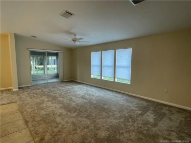 NO POPCORN CEILINGS HERE! This pristine clean unfurnished home on Indianwood Golf and Country Club in Florida - for sale on GolfHomes.com, golf home, golf lot