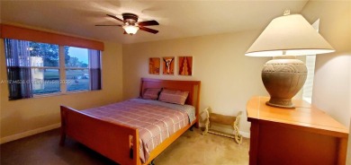 Beautiful GROUND FLOOR  2 bed 2 bath INSIDE CORNER UNIT in an on Sunrise Lakes Phase IV Golf Course in Florida - for sale on GolfHomes.com, golf home, golf lot