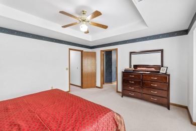 Welcome home to this bright and spacious 4bed/3.5bath/2car on Tallgrass Country Club in Kansas - for sale on GolfHomes.com, golf home, golf lot
