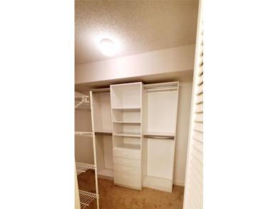 Beautiful GROUND FLOOR  2 bed 2 bath INSIDE CORNER UNIT in an on Sunrise Lakes Phase IV Golf Course in Florida - for sale on GolfHomes.com, golf home, golf lot