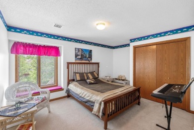 Welcome home to this bright and spacious 4bed/3.5bath/2car on Tallgrass Country Club in Kansas - for sale on GolfHomes.com, golf home, golf lot