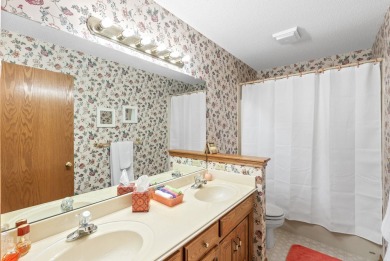 Welcome home to this bright and spacious 4bed/3.5bath/2car on Tallgrass Country Club in Kansas - for sale on GolfHomes.com, golf home, golf lot
