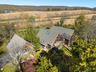 This contemporary charmer, adorned in Western Red Cedar Shake is on State College Elks Country Club in Pennsylvania - for sale on GolfHomes.com, golf home, golf lot
