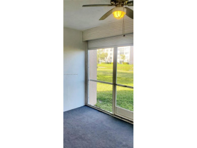 Beautiful GROUND FLOOR  2 bed 2 bath INSIDE CORNER UNIT in an on Sunrise Lakes Phase IV Golf Course in Florida - for sale on GolfHomes.com, golf home, golf lot