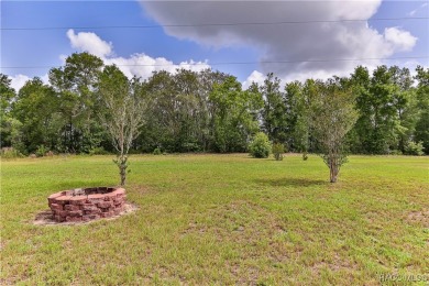 This 2-bedroom, 2-bathroom home features a 2-car garage on Brentwood Farms Golf Club in Florida - for sale on GolfHomes.com, golf home, golf lot