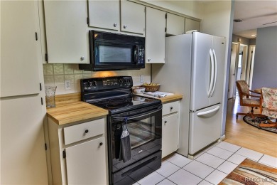 This 2-bedroom, 2-bathroom home features a 2-car garage on Brentwood Farms Golf Club in Florida - for sale on GolfHomes.com, golf home, golf lot