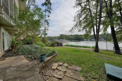 Experience the best of lakeside living with this stunning on Hide-A-Way Lake Golf Course in Texas - for sale on GolfHomes.com, golf home, golf lot