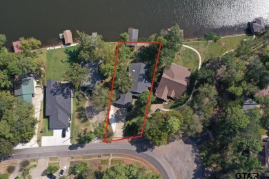 Experience the best of lakeside living with this stunning on Hide-A-Way Lake Golf Course in Texas - for sale on GolfHomes.com, golf home, golf lot