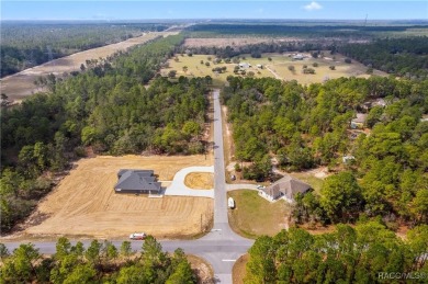 This 1-acre homesite in Citrus Springs is conveniently located on Pine Ridge Community Golf and Country Club in Florida - for sale on GolfHomes.com, golf home, golf lot