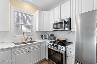 Wake up to panoramic views of St. James Marina from this on Members Club At St. James Plantation in North Carolina - for sale on GolfHomes.com, golf home, golf lot