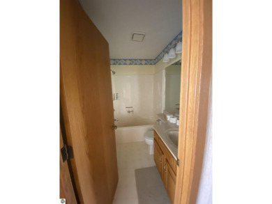 This is a great deal for a 4 bedroom, 3 bath condo just minutes on Crown Golf Course in Michigan - for sale on GolfHomes.com, golf home, golf lot