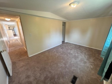 Come check out this charming 3 bed, 2 bath home in Colorado City on Hollydot Golf Course in Colorado - for sale on GolfHomes.com, golf home, golf lot