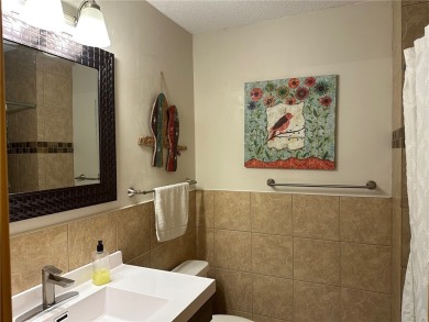 Cable, WI- Charming 2 BR, 2 BA top floor West end condo unit at on Lakewoods Forest Ridges Golf Club in Wisconsin - for sale on GolfHomes.com, golf home, golf lot