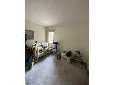 This is a great deal for a 4 bedroom, 3 bath condo just minutes on Crown Golf Course in Michigan - for sale on GolfHomes.com, golf home, golf lot