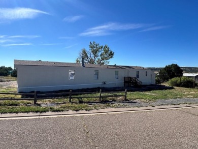 Come check out this charming 3 bed, 2 bath home in Colorado City on Hollydot Golf Course in Colorado - for sale on GolfHomes.com, golf home, golf lot