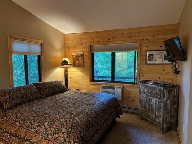 Cable, WI- Charming 2 BR, 2 BA top floor West end condo unit at on Lakewoods Forest Ridges Golf Club in Wisconsin - for sale on GolfHomes.com, golf home, golf lot