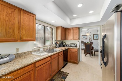 Home, sweet home! This charming 2-bedroom residence in Oakbrook on Westbrook Village Golf Club in Arizona - for sale on GolfHomes.com, golf home, golf lot