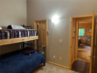 Cable, WI- Charming 2 BR, 2 BA top floor West end condo unit at on Lakewoods Forest Ridges Golf Club in Wisconsin - for sale on GolfHomes.com, golf home, golf lot