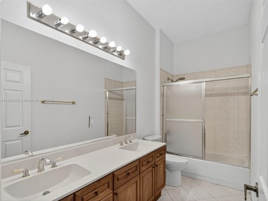 Welcome to Weston Hills! This sought-after floor plan offers 5 on  in Florida - for sale on GolfHomes.com, golf home, golf lot