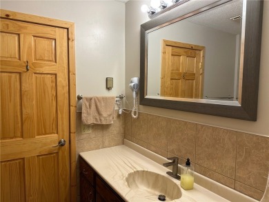 Cable, WI- Charming 2 BR, 2 BA top floor West end condo unit at on Lakewoods Forest Ridges Golf Club in Wisconsin - for sale on GolfHomes.com, golf home, golf lot