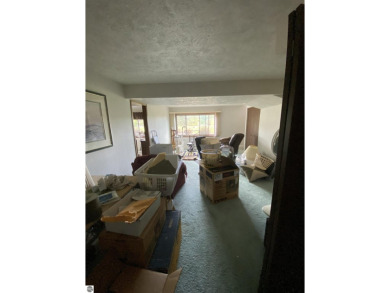 This is a great deal for a 4 bedroom, 3 bath condo just minutes on Crown Golf Course in Michigan - for sale on GolfHomes.com, golf home, golf lot