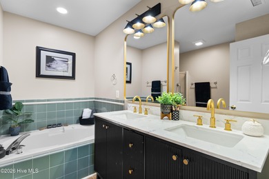 Wake up to panoramic views of St. James Marina from this on Members Club At St. James Plantation in North Carolina - for sale on GolfHomes.com, golf home, golf lot