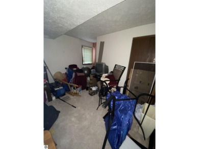 This is a great deal for a 4 bedroom, 3 bath condo just minutes on Crown Golf Course in Michigan - for sale on GolfHomes.com, golf home, golf lot