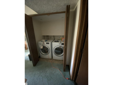 This is a great deal for a 4 bedroom, 3 bath condo just minutes on Crown Golf Course in Michigan - for sale on GolfHomes.com, golf home, golf lot
