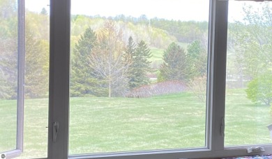 This is a great deal for a 4 bedroom, 3 bath condo just minutes on Crown Golf Course in Michigan - for sale on GolfHomes.com, golf home, golf lot