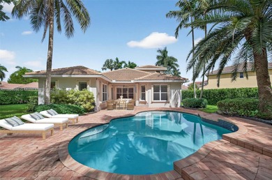 Welcome to Weston Hills! This sought-after floor plan offers 5 on  in Florida - for sale on GolfHomes.com, golf home, golf lot