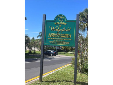 Move in Ready Home in desirable Golf Community of Wedgefield on Wedgefield Golf Club in Florida - for sale on GolfHomes.com, golf home, golf lot
