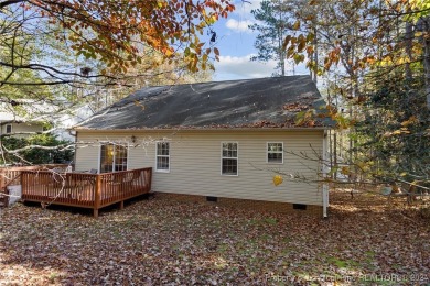 Located in a 24-hour guarded/gated community, this meticulously on Carolina Trace Country Club in North Carolina - for sale on GolfHomes.com, golf home, golf lot