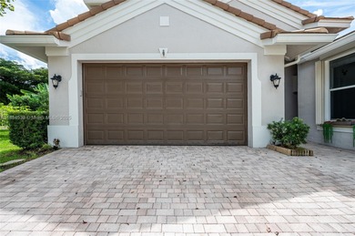 Welcome to Weston Hills! This sought-after floor plan offers 5 on  in Florida - for sale on GolfHomes.com, golf home, golf lot