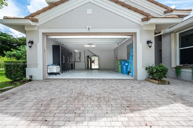 Welcome to Weston Hills! This sought-after floor plan offers 5 on  in Florida - for sale on GolfHomes.com, golf home, golf lot