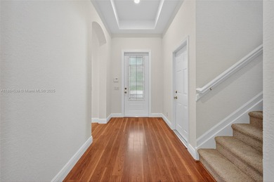 Welcome to Weston Hills! This sought-after floor plan offers 5 on  in Florida - for sale on GolfHomes.com, golf home, golf lot