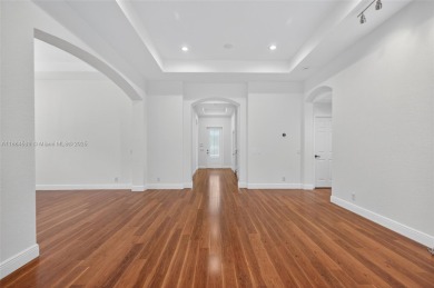 Welcome to Weston Hills! This sought-after floor plan offers 5 on  in Florida - for sale on GolfHomes.com, golf home, golf lot