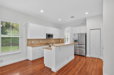 Welcome to Weston Hills! This sought-after floor plan offers 5 on  in Florida - for sale on GolfHomes.com, golf home, golf lot