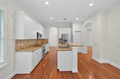 Welcome to Weston Hills! This sought-after floor plan offers 5 on  in Florida - for sale on GolfHomes.com, golf home, golf lot