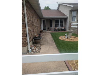 Enjoy easy, one-level living in this beautifully maintained on Terre Du Lac Golf and Country Club in Missouri - for sale on GolfHomes.com, golf home, golf lot
