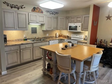 Enjoy easy, one-level living in this beautifully maintained on Terre Du Lac Golf and Country Club in Missouri - for sale on GolfHomes.com, golf home, golf lot