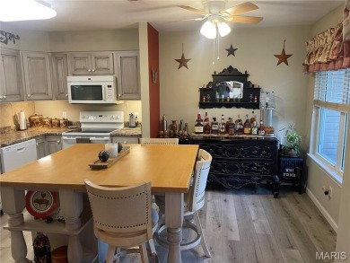Enjoy easy, one-level living in this beautifully maintained on Terre Du Lac Golf and Country Club in Missouri - for sale on GolfHomes.com, golf home, golf lot