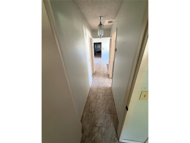 This 3-bedroom, 2-bathroom, 2-car garage home in Beacon Woods is on Beacon Woods Golf Club in Florida - for sale on GolfHomes.com, golf home, golf lot