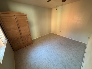 This 3-bedroom, 2-bathroom, 2-car garage home in Beacon Woods is on Beacon Woods Golf Club in Florida - for sale on GolfHomes.com, golf home, golf lot