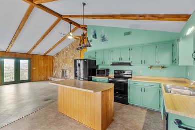 Tucked inside Mill Creek, this inviting mountain retreat is all on Mill Creek Country Club in North Carolina - for sale on GolfHomes.com, golf home, golf lot