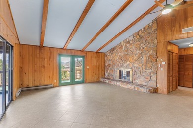 Tucked inside Mill Creek, this inviting mountain retreat is all on Mill Creek Country Club in North Carolina - for sale on GolfHomes.com, golf home, golf lot